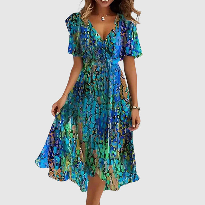 Delphine | Ditsy Floral Wrap Womens Pleated Midi Dress with Flutter Sleeves
